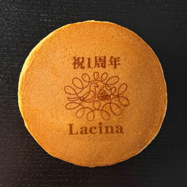 1周年（ロゴ）Lacina